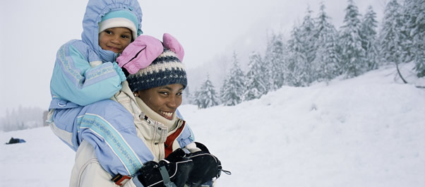 mom and child in snow