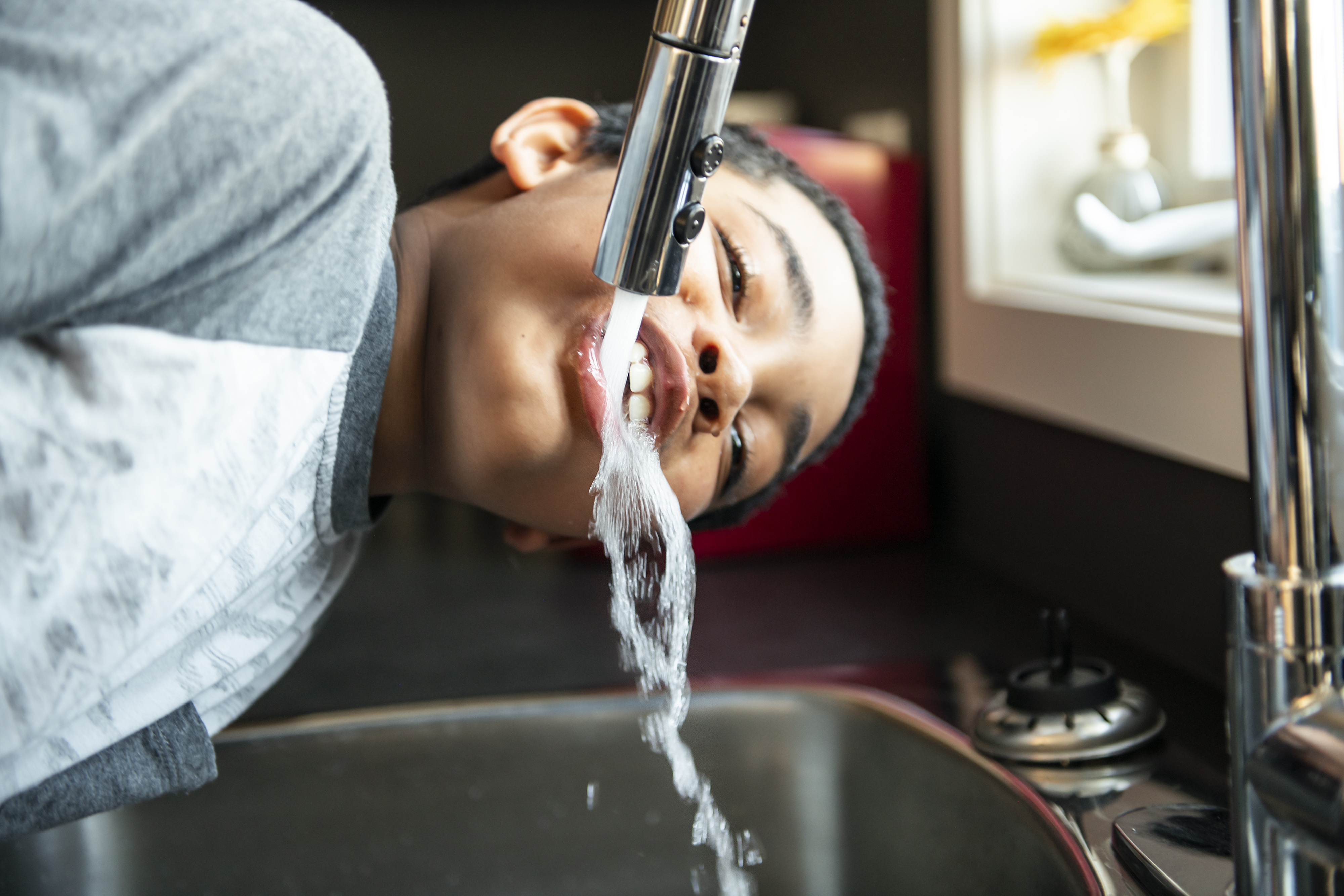 child drinking water