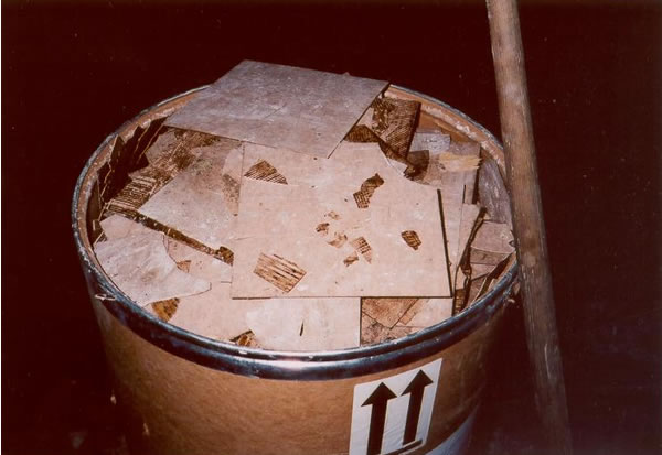 Damaged floor tile in barrel