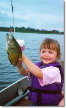 little girl catching fish