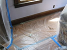 Floor Covered with Plastic Sheeting
