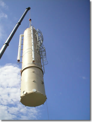 Air-stripping tower being lifted