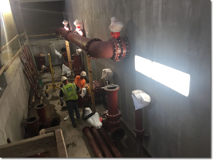 Installation of the high-service pumps at the new plant.