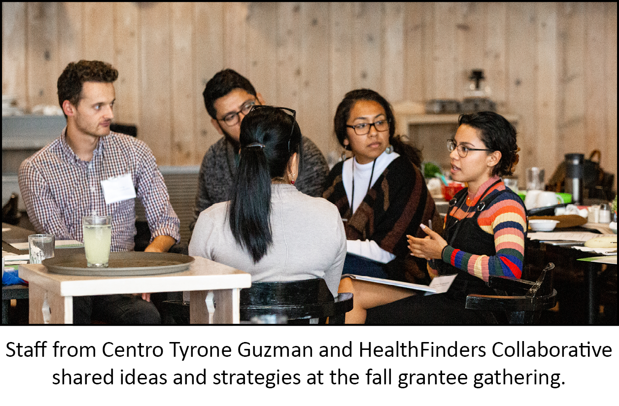 Staff from Centro Tyrone Guzman and HealthFinders Collaborative share ideas at fall gathering