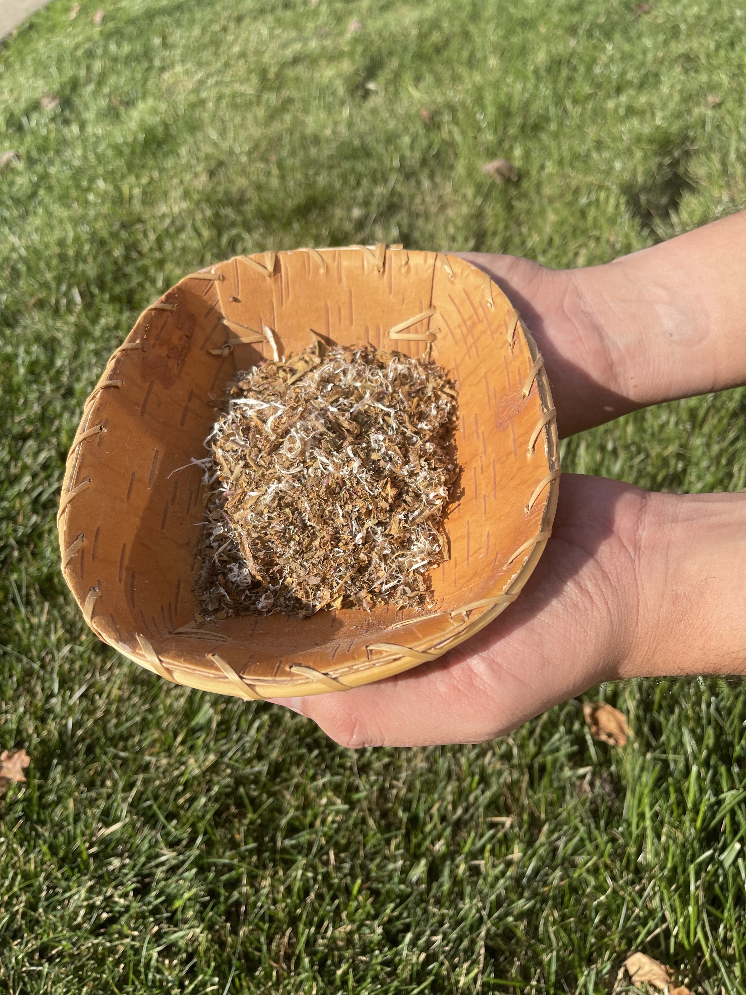 a bowl of traditional tobacco leaves