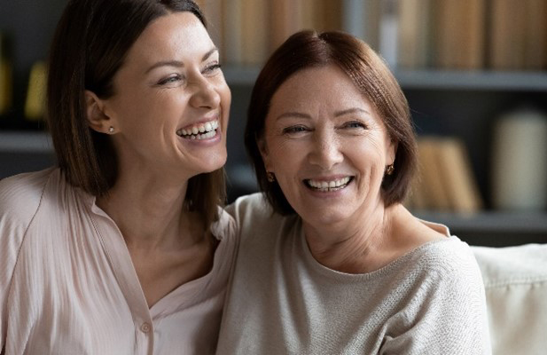 Two women smiling