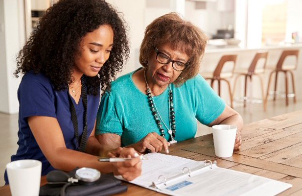 Women looking at documents together