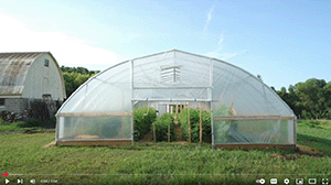 a greenhouse on a farm.