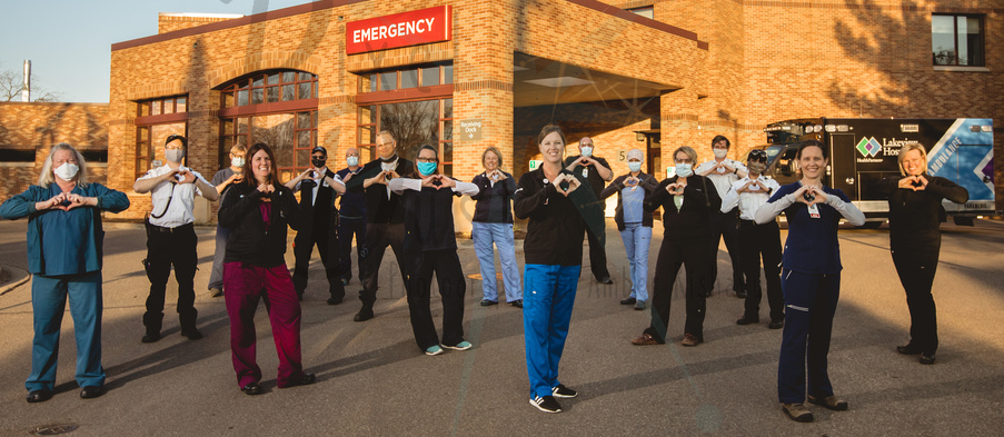 healthcare workers standing outside with masks on