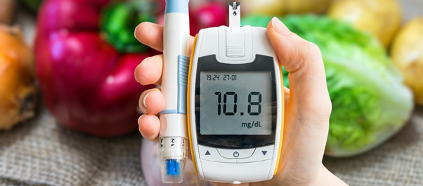 fruits, vegetables and blood sugar tester