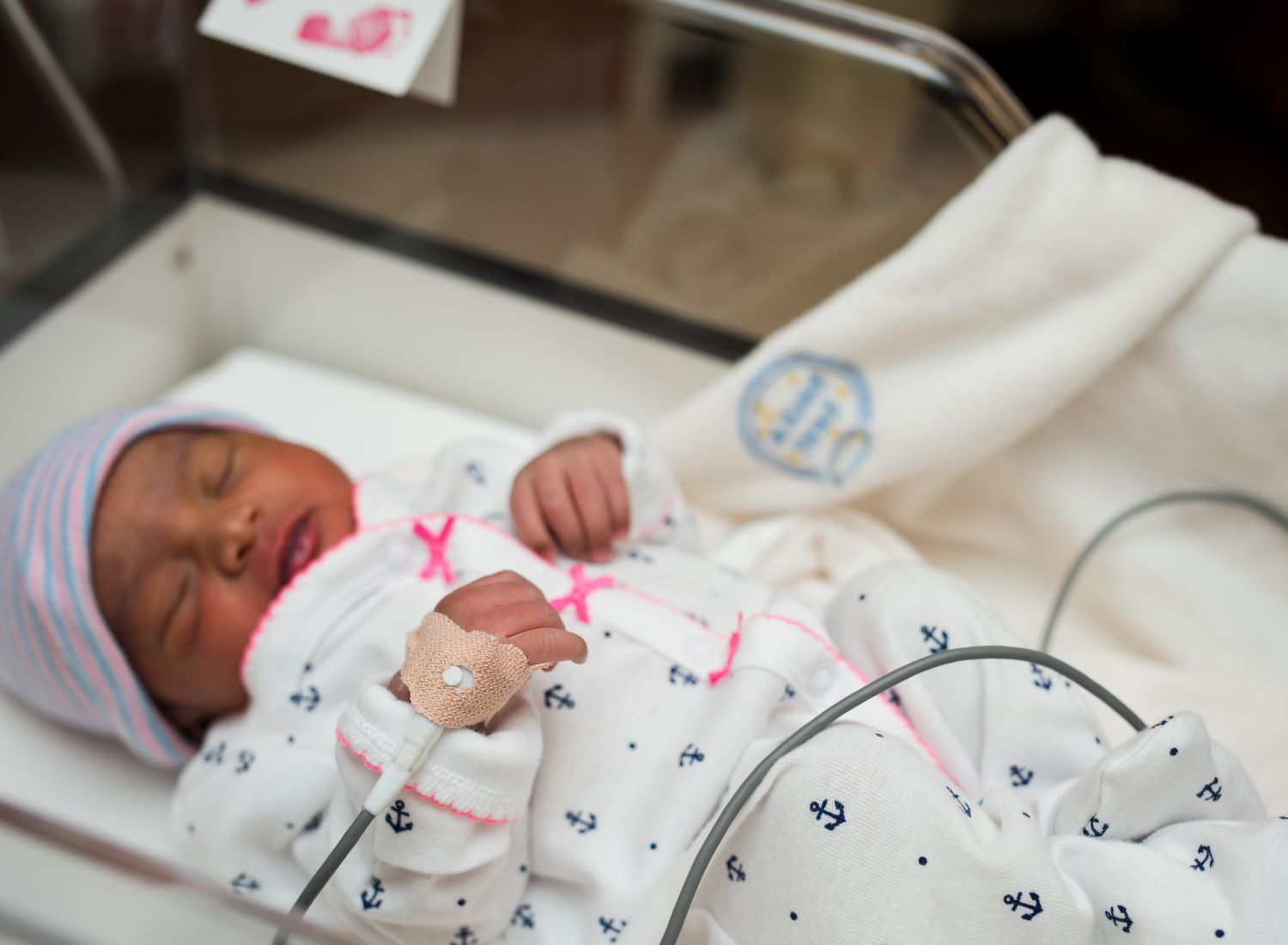 Newborn baby being monitored